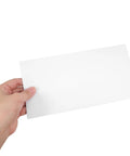 Hand holding white self-seal confidentiality envelope 115mm by 225mm for office documents and shipping, flat white paper security mail envelopes.