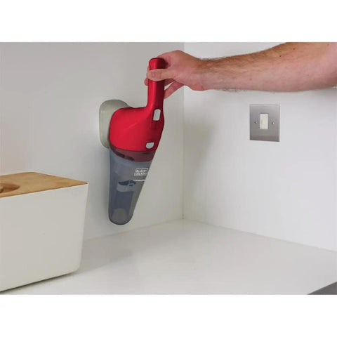 Compact Lithium Hand Vacuum Kit With 2Ah Battery for Cars and Home wall mounted charging in kitchen.