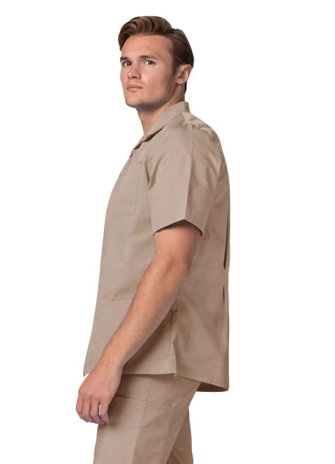 Top Tier Mens Scrub Jacket With Zip Front And Legit Pen Pocket Hella Comfy Khaki Healthcare Top For Nurses And Doctors Smooth All Day Care Vibe Straight Fire Clinical Uniform For Everyday Pros, side view of khaki scrub jacket.