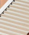 Close-up of stainless steel wavy blade vegetable slicer for crinkle-cut fries.