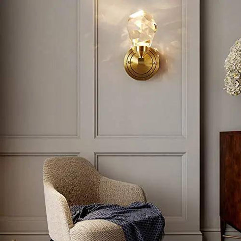 Modern Copper Crystal Wall Sconce Straight Up Stunning For Living Room And Bedroom Top Tier Bedside Lamps With Glare Free Hand Cut Shades Giving Your Space A Total Glow Up mounted on wall with crystal diffuser and gold accents.