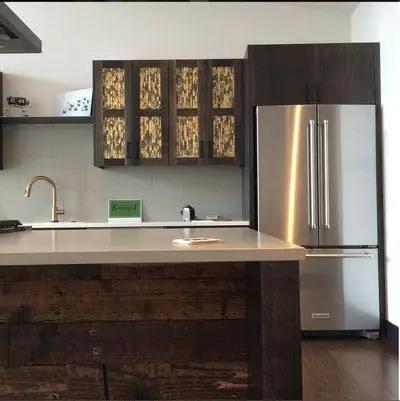 Pro Grade Black Bogwood Reactive Water Based Interior Wood Stain In A Heavy Duty 55 Gallon Drum on kitchen cabinetry.