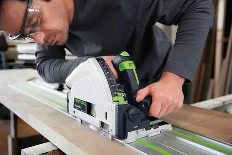 Killer 1200W Plunge Cut Circular Saw With Blazing 5200 RPM Speed And Compact Build For Nailing Dead Straight Door Trims Up To 55mm On Guide Rails With Zero Drama Or Mess in use on a guide rail.