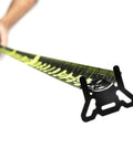 Close-up of Home Measuring Tape And Layout Tool Black 35 Foot Tape Measure showing extended blade held in hand for DIY projects.