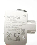 Close-up of LR-ZB240CB Laser Sensor showing technical specifications and multiple connection ports for industrial automation.