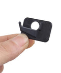 Close-up of a Six Pack Plastic Arrow Rest for Recurve Bow Black Self Adhesive Arrow Rest held in hand