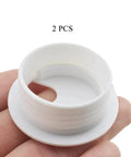 Heavy Duty U Shaped Desk Wire Grommets Kick Cable Clutter To The Curb With These Thick White Abs Plastic Cord Hole Covers 1.5 Inch Desk Grommet Two Pack, showing a white grommet cover in hand.
