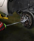 Slide Hammer Puller Set With Dent Puller CV Axle And Bearing Removal Tool Kit in use for automotive hub repair