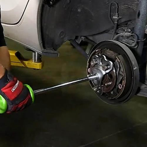Slide Hammer Puller Set With Dent Puller CV Axle And Bearing Removal Tool Kit in use for automotive hub repair