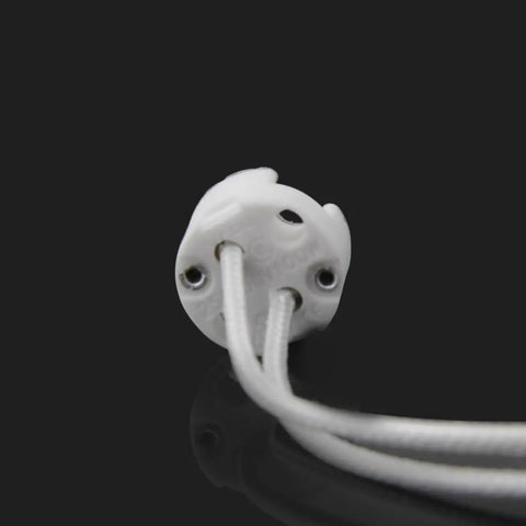 Close-up of a MR16 ceramic lamp holder with 140mm lead wires for easy installation in LED fixtures.