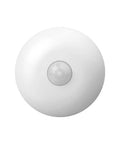 Real Deal Hardwired Pir Ceiling Motion Sensor Switch With 360 Degree Sweep And Auto Light Controls For Easy Peasy Installation And Smooth Operation In Retail Spaces And Warehouses, top view of white sensor.