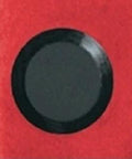 Black plastic hole plug from Fifty Piece Flush Mount Plastic Hole Plug Set For Auto Body And Sheet Metal, shown installed in red panel.