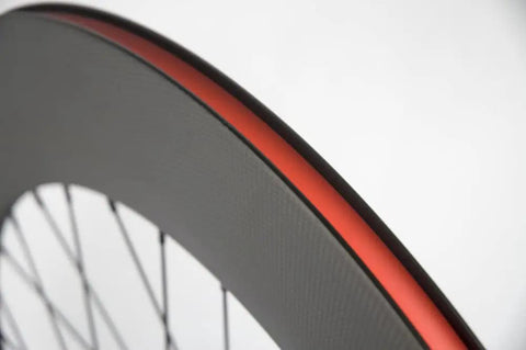 Close-up of rim detail in the Tri Spoke 88mm Carbon Wheelset For 700c Clincher Fixed Gear Track Bikes, Front And Rear