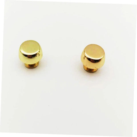 Gold suitcase-style bag feet rivets; two metal handbag studs, front view