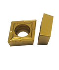 Front view of two gold carbide CCMT turning inserts with center mounting holes