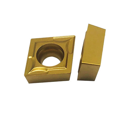 Front view of two gold carbide CCMT turning inserts with center mounting holes