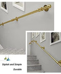 Heavy Duty Gold Wall Mounted Handrail For Stairs Bathroom Safety Support Bar Built Tough Anti Slip Grab Rail For Elderly Accessible Home Reno And Upgrades installed on a staircase.
