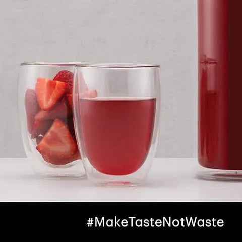 Set Of Six Double Wall Insulated Glass Tumblers Twelve Ounce Capacity Heat Resistant Borosilicate Construction Clear Look with red drink and fresh strawberries.