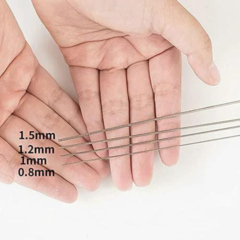 VIGAN stainless steel spring wires in four gauges (0.8–1.5 mm) held in hands