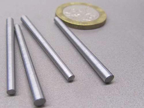 Heavy Duty 18-8 Stainless Steel Taper Pin Set For Precision Machining, 0.125 Inch Large Diameter And 0.094 Inch Small Diameter, 1.50 Inch Long, 10 Piece Pack For Tight Fits, Easy Assembly, And Reliable Alignment shown with a coin for scale.