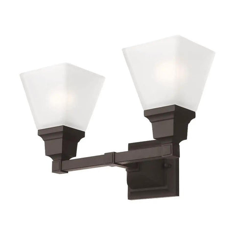 Mission Style Two Light Bath Light In Polished Nickel With Transitional Steel Design That Looks Sleek In Any Bathroom Vanity Lighting Fixture With Classic Vibe Measures 15 By 7.75 By 9.5 Inches showing two square white shades.