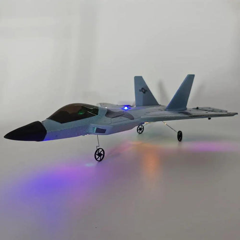 F22 Raptor RC Plane With LED Lights 4CH 3D 6G Gyro 2.4GHz Remote Control Fighter Jet on display with glowing LED lights