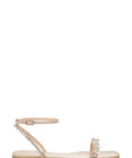 Side view of Kensy Flat Sandal For Women In Champagne With Ornate Embellishment And Breathable Leather Lining Easy Slip On Comfort Sandal