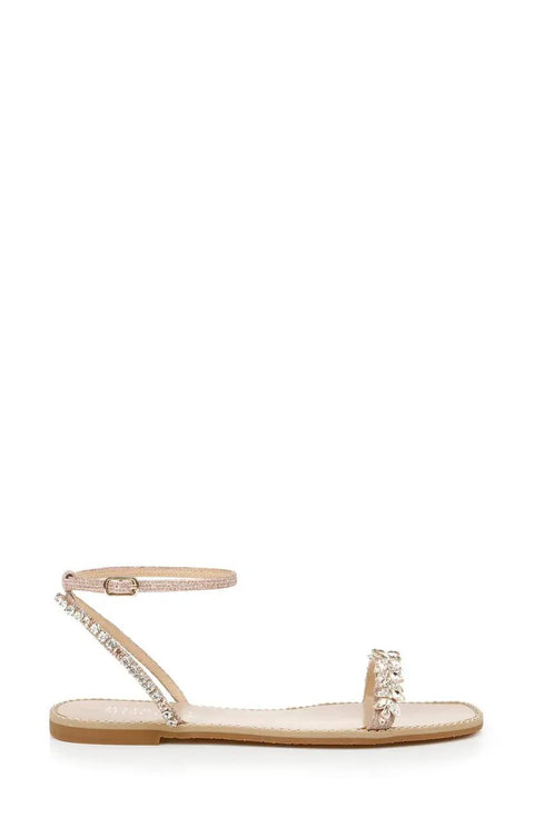 Side view of Kensy Flat Sandal For Women In Champagne With Ornate Embellishment And Breathable Leather Lining Easy Slip On Comfort Sandal