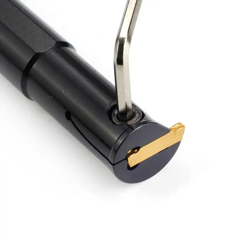 Close-up of Five Eighth Inch Shank Grooving Cutoff Tool Holder Boring Bar With Four Point Nine Inch Overall Length showing carbide insert