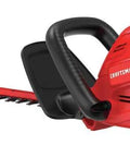 Red powerful 22 inch corded hedge trimmer with dual action blades for easy yard pruning, built for tough trim jobs, side view.