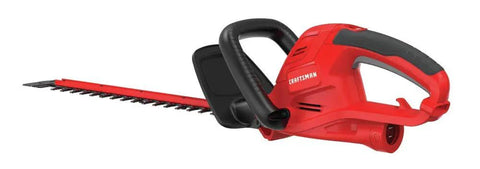 Red powerful 22 inch corded hedge trimmer with dual action blades for easy yard pruning, built for tough trim jobs, side view.