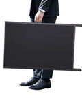 Person carrying the Beefy Heavy Duty Slide In Folding Sandwich Board A Frame Sidewalk Sign 24 By 36 Inch Black Coated Steel.