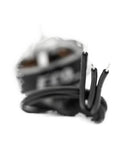 Close-up of 1404 Size 2S To 4S 6000KV C-W Brushless Drone Motor for FPV Racing RC Drones with wires and lightweight design.