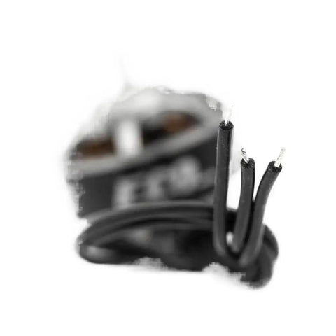 Close-up of 1404 Size 2S To 4S 6000KV C-W Brushless Drone Motor for FPV Racing RC Drones with wires and lightweight design.