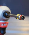 Cleanable Reversible 4 Inch Magnetic Hex Chuck Driver With Dual Sided Magnetic Hex Bit And Easy Clean Magnet attached to drill