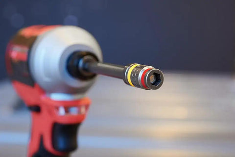 Cleanable Reversible 4 Inch Magnetic Hex Chuck Driver With Dual Sided Magnetic Hex Bit And Easy Clean Magnet attached to drill