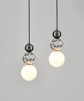 Aolyzmt Natural Alabaster Marble Pendant Light, Modern Cylinder LED Hanging Lamp, Black Gold Ceiling Light Fixture with Frosted White Glass Shade for Kitchen Island, Dining Room, Living Room, Bedroom with spherical design.