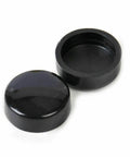 Close-up of black snap-on bolt covers from 8 Pack Black License Plate Screw Caps For Cars, Trucks, And Vans, Universal Fit