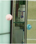 Self-Stick Drawer Knobs And Pull Handles Set 10 Pcs White Plastic ABS on glass cabinet door, pink and blue knobs visible