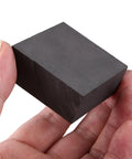 Hand holding Graphite Sheet Plate Block And Strip For Scientific Research And University Teaching Labs Pro Grade High Purity Graphite
