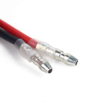 Close-up view of solder tabs on 540 Brushed RC Motor 55T Waterproof for 1/10 Scale Crawlers, showing red and black wires.
