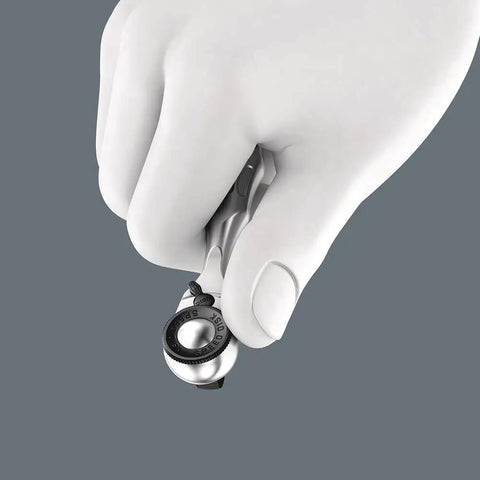 Human hand holding Zyklop Mini 3 Ratchet With One Quarter Inch Drive, 87 mm Length, Compact Pro Grade Hand Tool For Tight Spaces
