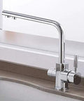 Ch Kitchen Faucet with 360° SwivelDual Handle Drinking Water Filter TapDeck Mounted Mixer with Aerator3-Way Design for Clean Water - LWX standing beside a sink.
