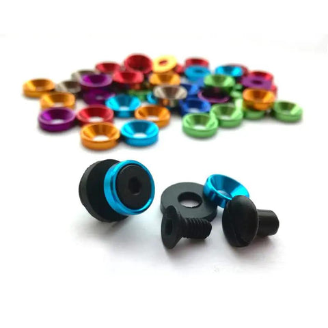Top Shelf Chicago Screws And Stainless Steel 304 Holster Fasteners With Mixed Color Aluminum Spacers For Kydex Leather Belt Clips and secure outdoor carry hardware displayed with colorful aluminum pieces.