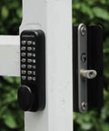 Heavy Duty Double Sided Digital Gate Lock For Left Handed Doors with keypad on white gate post.