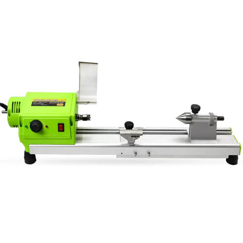 Dope Compact Benchtop Wood Lathe With Variable Speed For DIY Makers showing green machinery and metal components on bench.