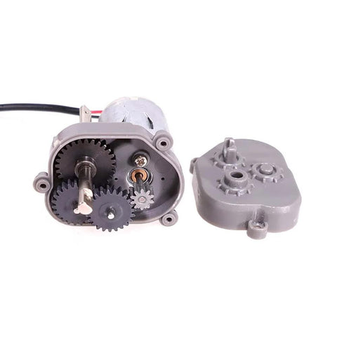 Front view of RC steel transmission gear set for 1/12 RC crawler, gray housing with black gears.