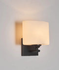 Modern Black Milk Glass Wall Sconces, 1 Pack Hardwired Wall Light Fixtures mounted on wall with warm light.