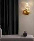 Modern Copper Crystal Wall Sconce Straight Up Stunning For Living Room And Bedroom Top Tier Bedside Lamps With Glare Free Hand Cut Shades giving soft light in a cozy setting.
