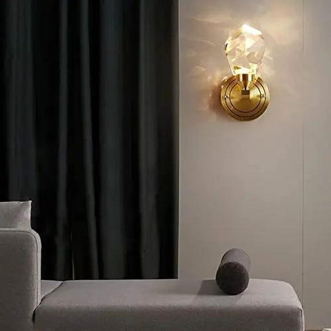 Modern Copper Crystal Wall Sconce Straight Up Stunning For Living Room And Bedroom Top Tier Bedside Lamps With Glare Free Hand Cut Shades giving soft light in a cozy setting.